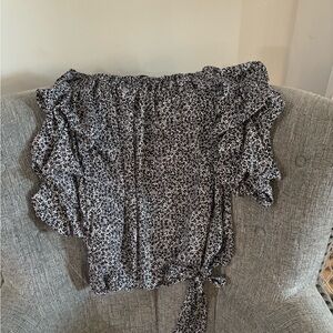 White and black floral blouse with gathered neck, ruffled sleeves, with side bow